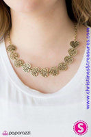 Airy brass heart frames link below the collar, creating a whimsical chain. Brushed in an antiqued finish, the stenciled hearts are delicately hammered for a shimmery finish. Features an adjustable clasp closure. Sold as one individual necklace. Includes one pair of matching earrings.   P2WH-BRXX-080XX