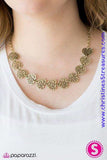 Airy brass heart frames link below the collar, creating a whimsical chain. Brushed in an antiqued finish, the stenciled hearts are delicately hammered for a shimmery finish. Features an adjustable clasp closure. Sold as one individual necklace. Includes one pair of matching earrings.   P2WH-BRXX-080XX